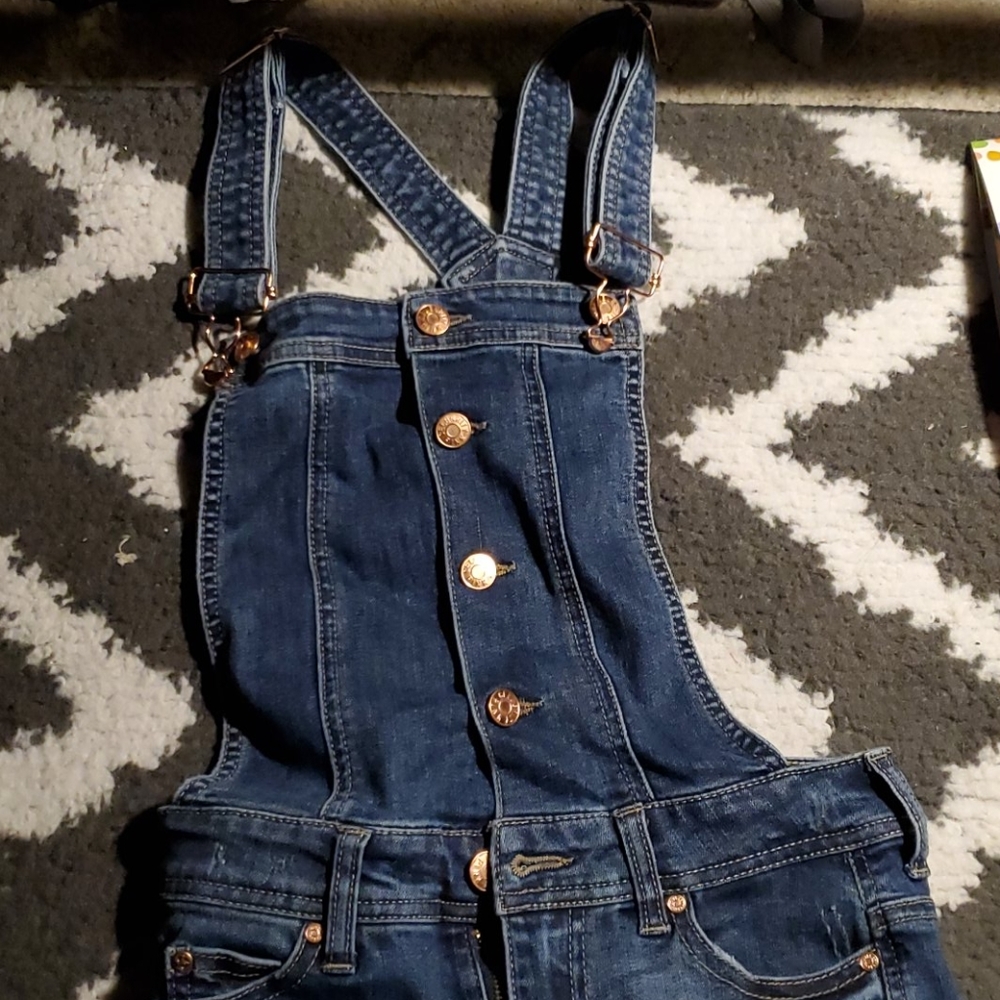 Skinny jean overalls distressed